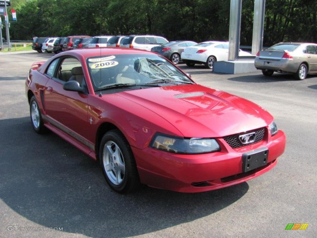 2002 Mustang V6 Coupe - Laser Red Metallic / Medium Parchment photo #6