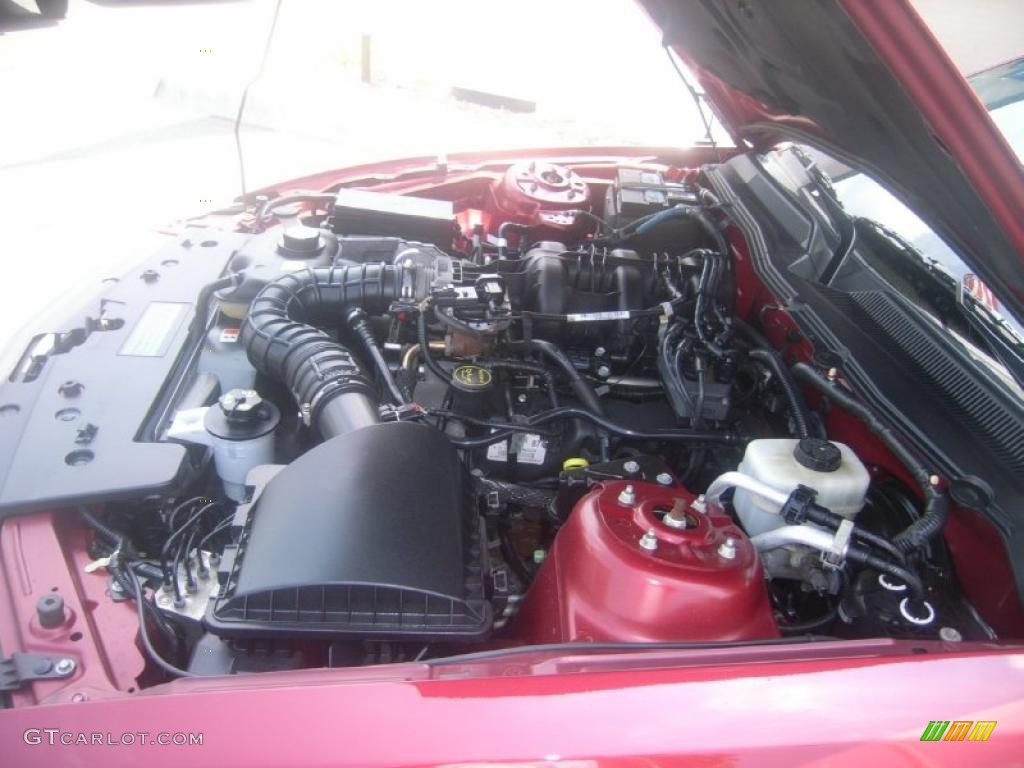 2006 Mustang V6 Deluxe Coupe - Redfire Metallic / Light Graphite photo #20