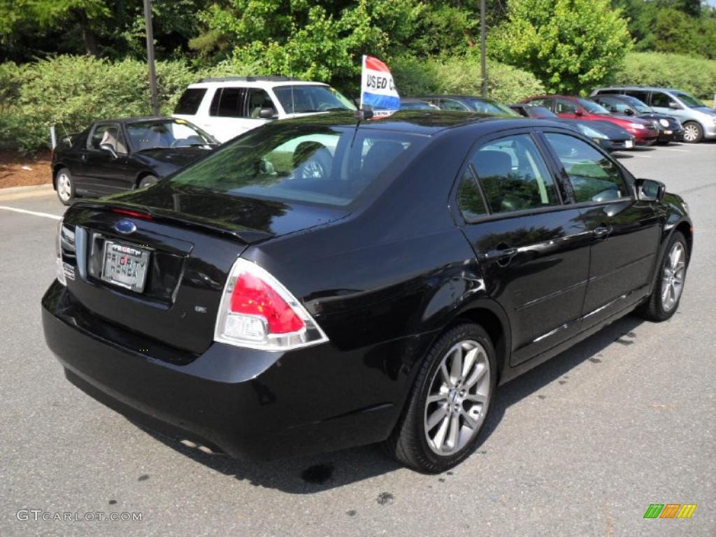 2009 Fusion SE - Tuxedo Black Metallic / Charcoal Black/Red Accents photo #4