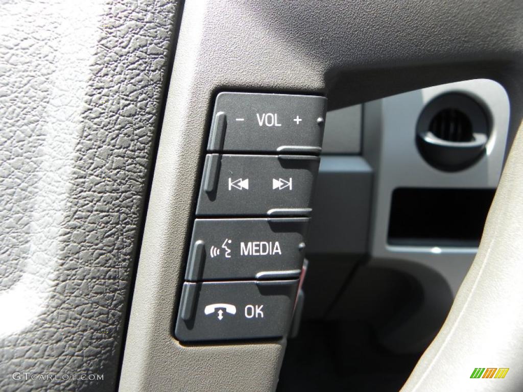 2010 F150 XLT Regular Cab - Tuxedo Black / Medium Stone photo #22