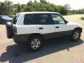 White - RAV4  Photo No. 4