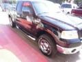 2006 Black Ford F150 XLT SuperCab 4x4  photo #44