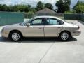 1998 Prairie Tan Metallic Ford Taurus LX  photo #6