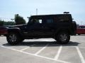 2010 Black Jeep Wrangler Unlimited Mountain Edition 4x4  photo #6