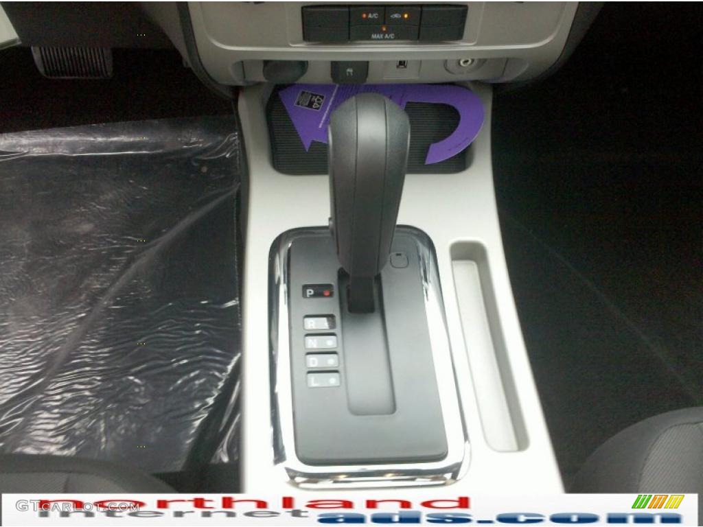 2010 Escape XLT V6 4WD - Ingot Silver Metallic / Charcoal Black photo #18