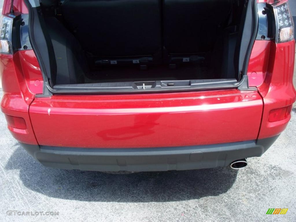 2010 Outlander SE - Rally Red Metallic / Black photo #30