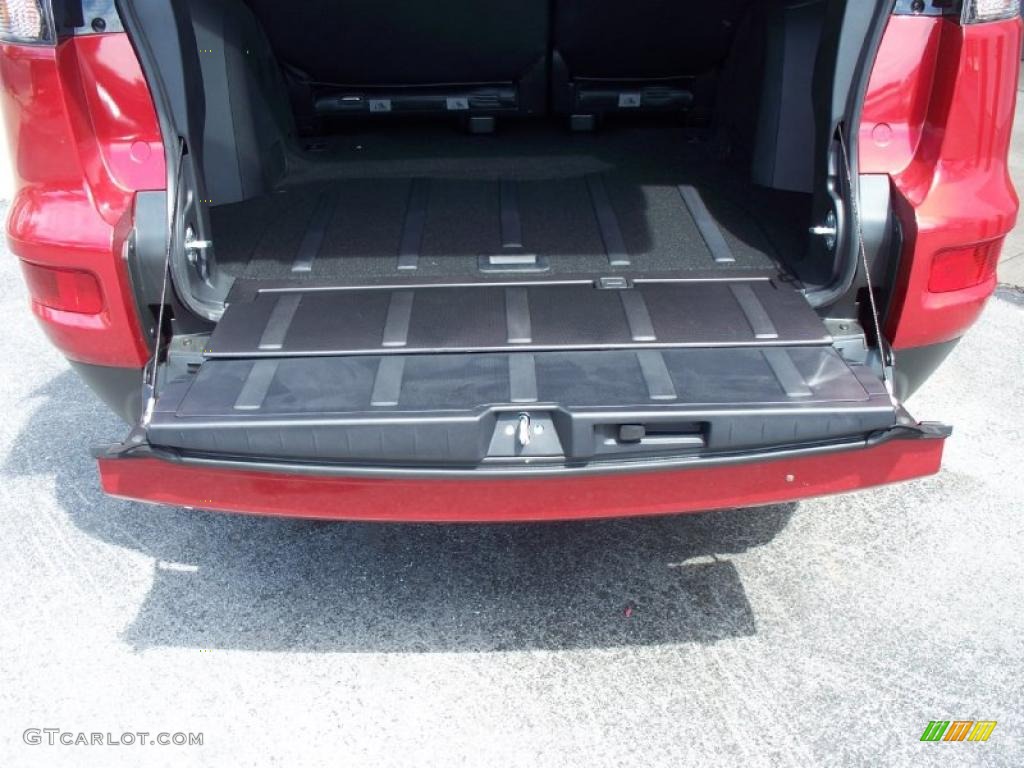 2010 Outlander SE - Rally Red Metallic / Black photo #31