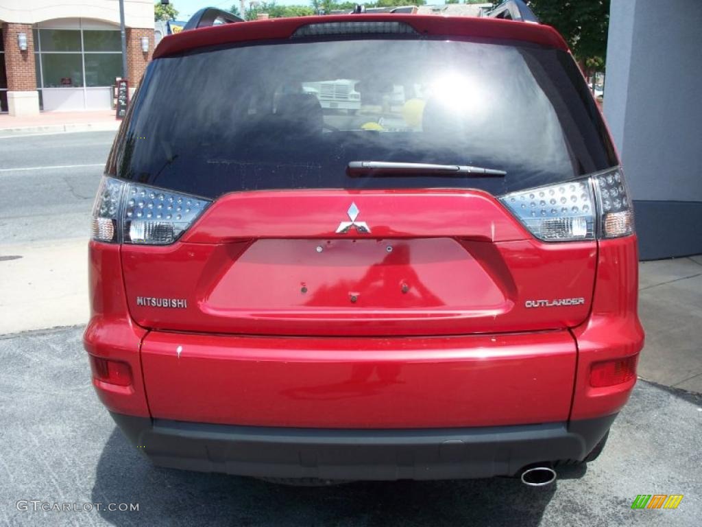 2010 Outlander SE - Rally Red Metallic / Black photo #32