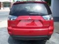 2010 Rally Red Metallic Mitsubishi Outlander SE  photo #32