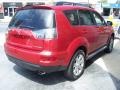 2010 Rally Red Metallic Mitsubishi Outlander SE  photo #33