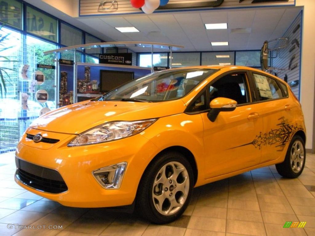 2011 Fiesta SES Hatchback - Yellow Blaze Metallic Tri-Coat / Charcoal Black/Blue Cloth photo #1