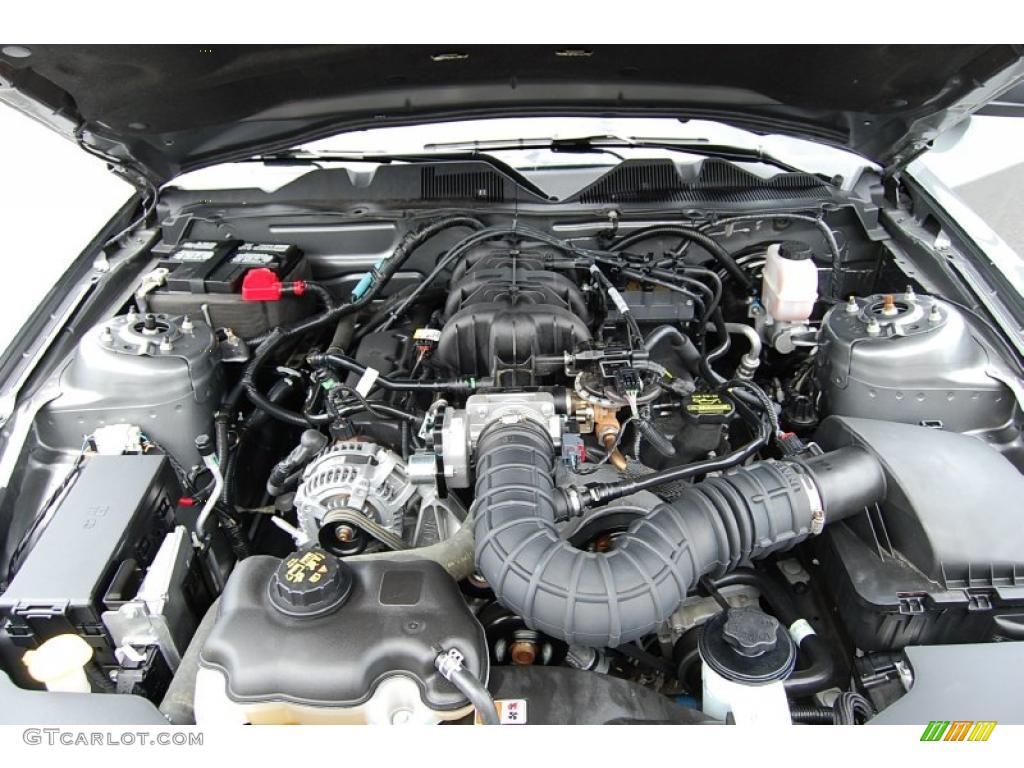 2010 Mustang V6 Premium Coupe - Sterling Grey Metallic / Stone photo #20