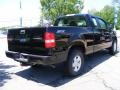 2005 Black Ford F150 STX SuperCab 4x4  photo #5
