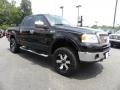 2006 Black Ford F150 Lariat SuperCrew 4x4  photo #1