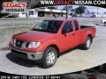 2010 Red Alert Nissan Frontier SE V6 King Cab 4x4  photo #1