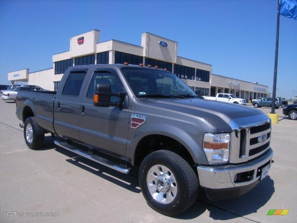 2009 F350 Super Duty Lariat Crew Cab 4x4 - Sterling Grey Metallic / Medium Stone photo #1