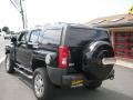 2009 Black Hummer H3 Alpha  photo #2