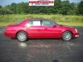 2010 Crystal Red Tintcoat Cadillac DTS   photo #1