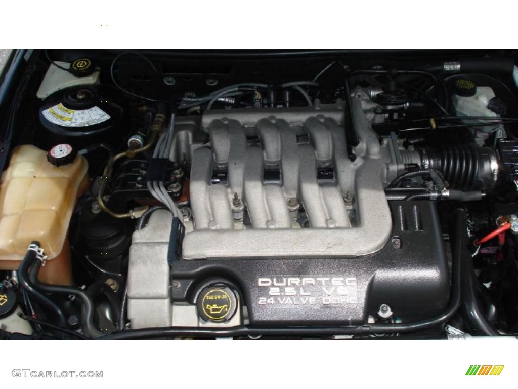 2002 Cougar V6 Coupe - Black / Dark Graphite photo #9