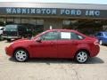 2009 Sangria Red Metallic Ford Focus SES Sedan  photo #1