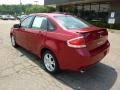 2009 Sangria Red Metallic Ford Focus SES Sedan  photo #2