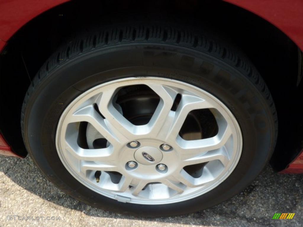 2009 Focus SES Sedan - Sangria Red Metallic / Charcoal Black photo #9