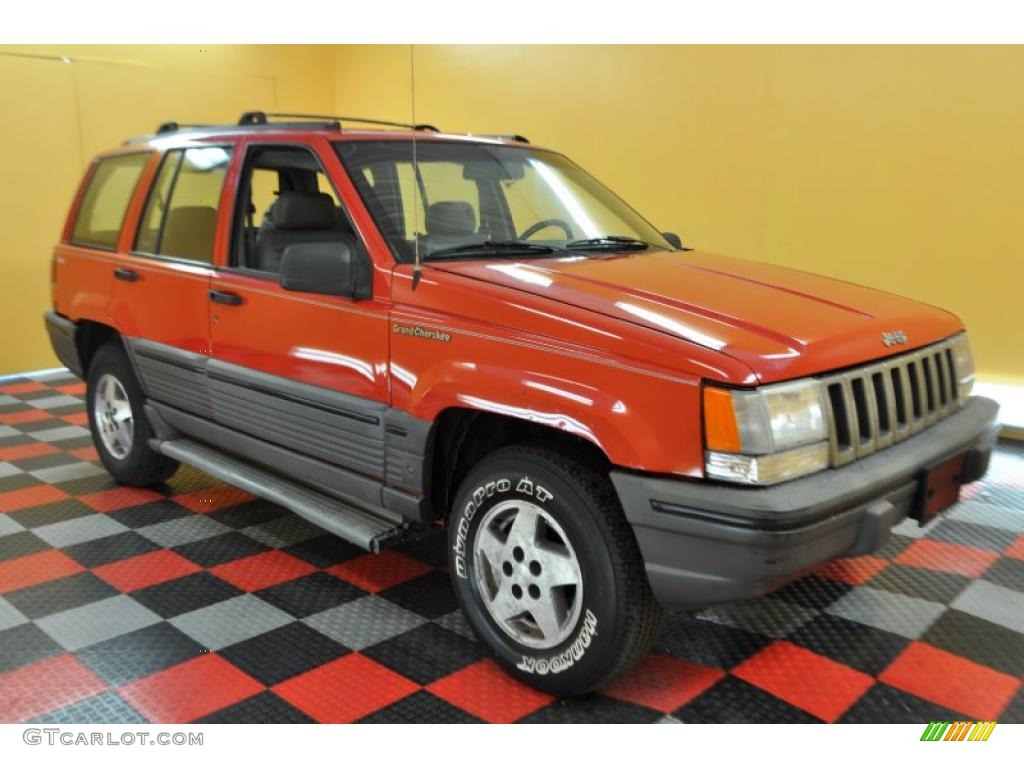 1997 Grand Cherokee Laredo 4x4 - Flame Red / Agate Black photo #1