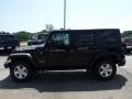 2010 Black Jeep Wrangler Unlimited Islander Edition 4x4  photo #5