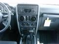 2010 Black Jeep Wrangler Unlimited Islander Edition 4x4  photo #19