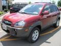 2009 Mesa Red Hyundai Tucson SE V6 4WD  photo #1