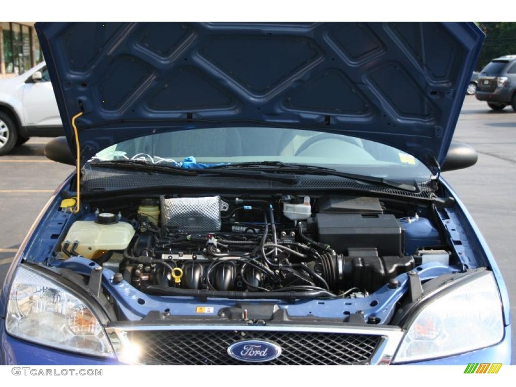 2005 Focus ZX4 SE Sedan - French Blue Metallic / Dark Flint/Light Flint photo #4