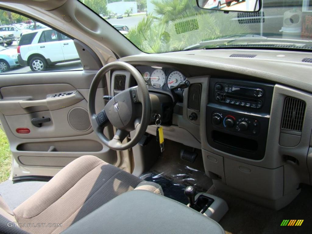 2004 Ram 1500 SLT Quad Cab 4x4 - Light Almond Pearl / Taupe photo #17