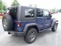 2010 Deep Water Blue Pearl Jeep Wrangler Unlimited Mountain Edition 4x4  photo #3