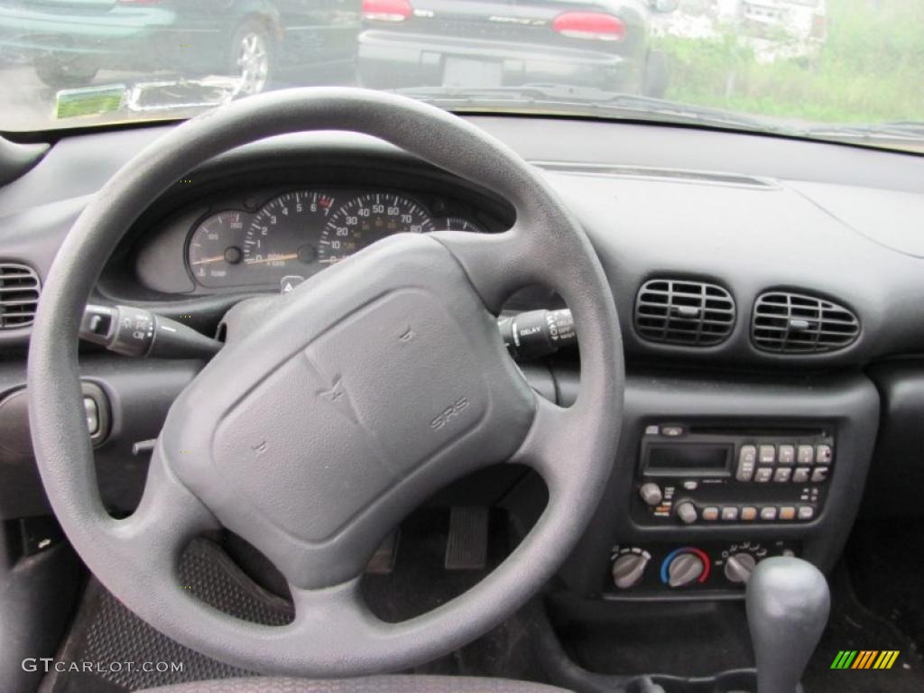 2002 Sunfire SE Coupe - Yellow / Graphite photo #4
