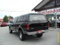 2002 Black Ford F150 XLT SuperCab 4x4  photo #7