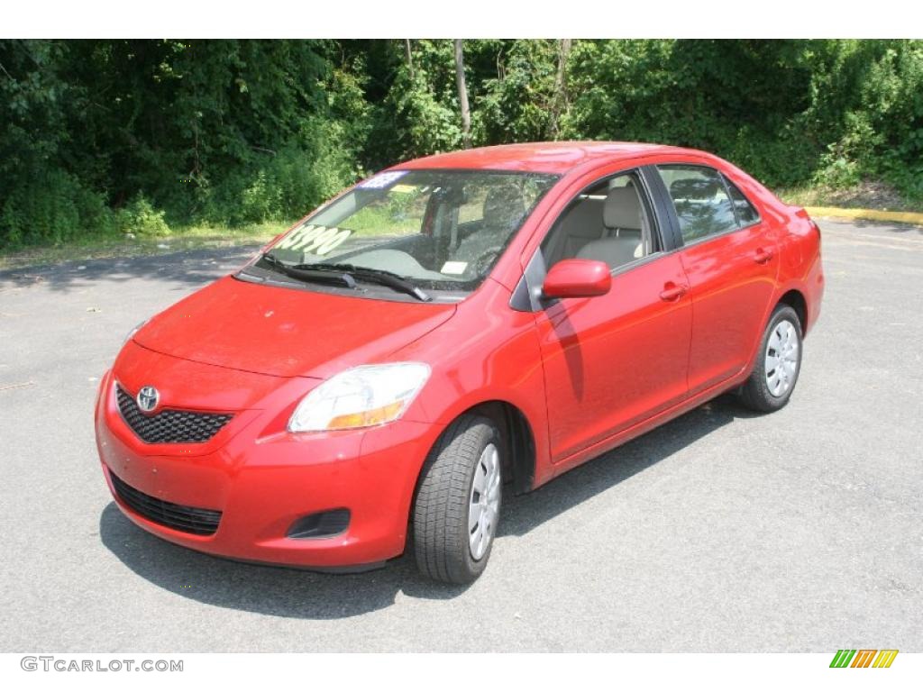 2009 Yaris Sedan - Absolutely Red / Dark Charcoal photo #1