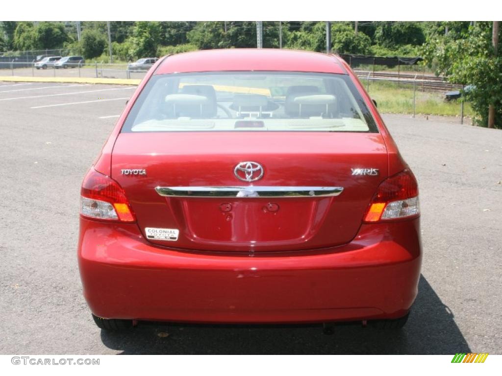 2009 Yaris Sedan - Absolutely Red / Dark Charcoal photo #6
