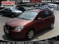 2007 Volcanic Red Kia Rondo LX  photo #1