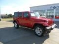 2010 Flame Red Jeep Wrangler Unlimited Sahara 4x4  photo #1