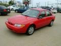 2002 Bright Red Ford Escort SE Sedan  photo #2