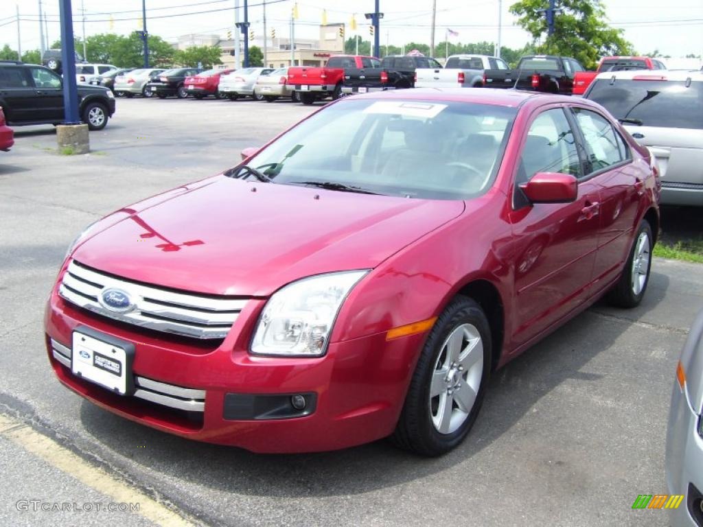 2007 Fusion SE V6 - Redfire Metallic / Light Stone photo #1