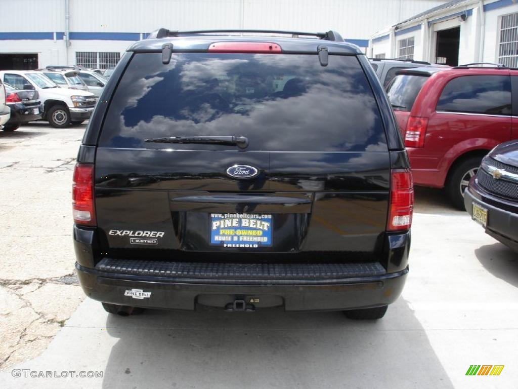 2002 Explorer Limited 4x4 - Black Clearcoat / Medium Parchment photo #6