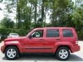 2009 Red Rock Crystal Pearl Jeep Liberty Sport  photo #2