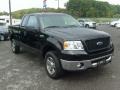 2006 Black Ford F150 XLT SuperCab 4x4  photo #1