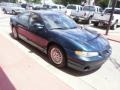 1997 Dark Teal Metallic Pontiac Grand Prix GT Sedan  photo #11