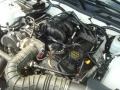 2005 Performance White Ford Mustang V6 Deluxe Coupe  photo #22