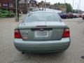 2005 Light Tundra Metallic Ford Focus ZX4 SE Sedan  photo #3