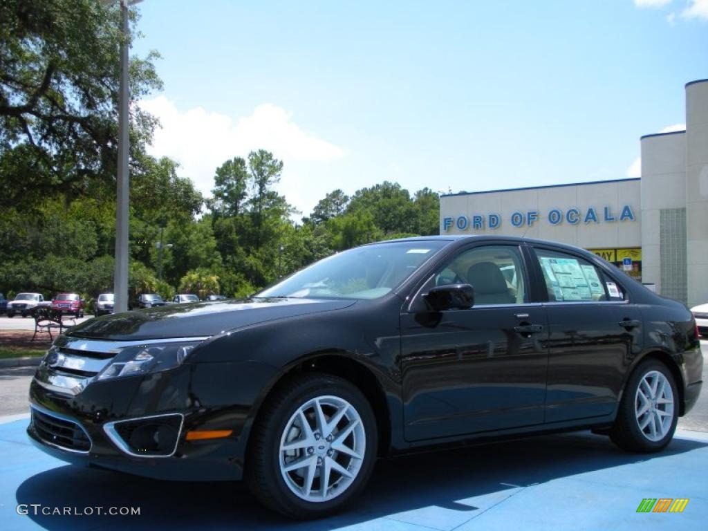 2010 Fusion SEL V6 - Tuxedo Black Metallic / Medium Light Stone photo #1