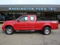 2003 Bright Red Ford F150 STX SuperCab 4x4  photo #1