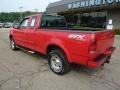 2003 Bright Red Ford F150 STX SuperCab 4x4  photo #2